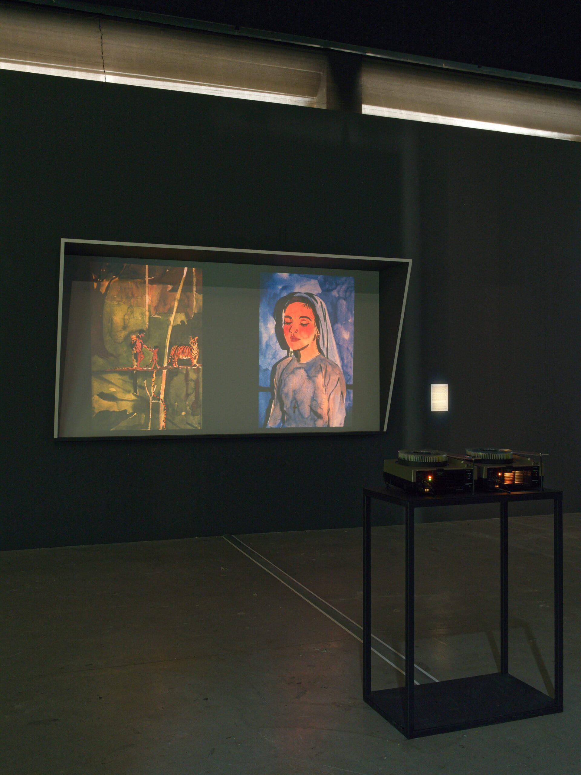 Thảo Nguyên Phan, “Forêt, Femme, Folie” (2025), watercolour painting, slide projector, archival photography, exhibition view at Palais de Tokyo, Paris. Photo: Aurélien Mole, courtesy of Zink Gallery (Waldkirchen).