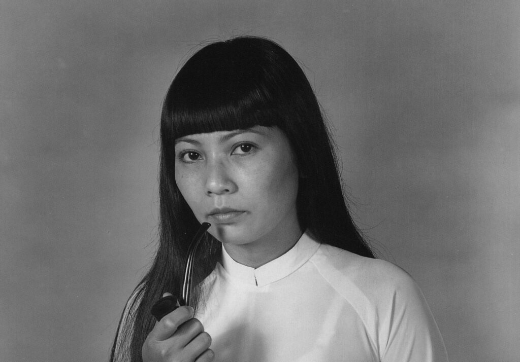 Hanh Thi Pham, “Self Portrait / Hairy / Pipe” (1985), silver gelatin print, 100 x 75 cm. Photo: Brian Doan.