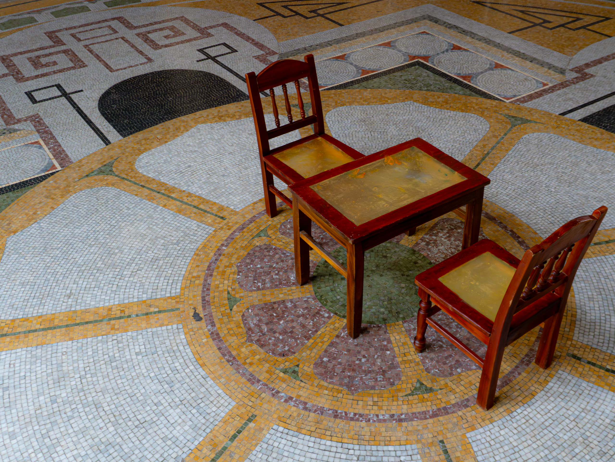 KV Duong, “Playground” (2025), acrylic on latex (resin-fibreglass backing), found children's chairs (2) and table (1); dimension varied; chair 68 x 35 x 35 cm, table 45 x 60 x 39 cm. Photo: Thao Linh Tran / VAC.