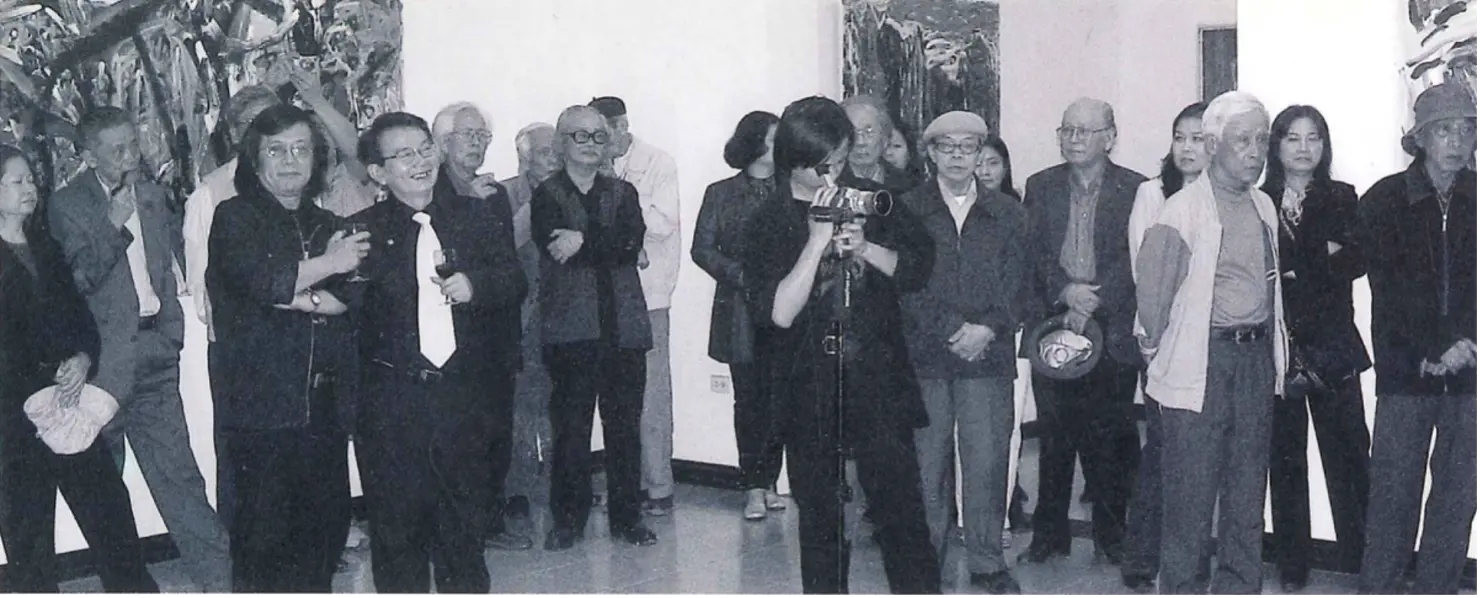Trần Lưu Hậu and family at the exhibition